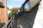 Stripping the Roof Tiles below dormers